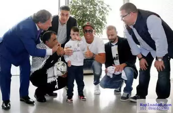 Aww!! Ronaldo Visits Boy Who Lost His Entire Family In Bomb Blast, But Adores Him – Photos
